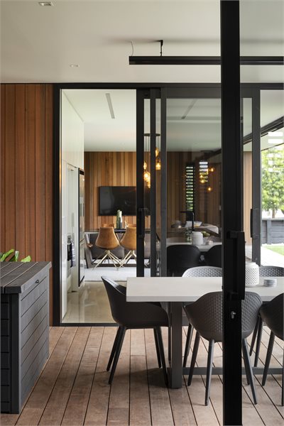 Sliding doors create an internal deck for covered entertaining