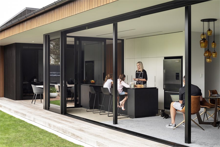 APL Architectural Series sliding doors line this family home