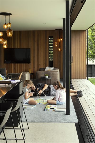 Matt Black joinery complements the home's style
