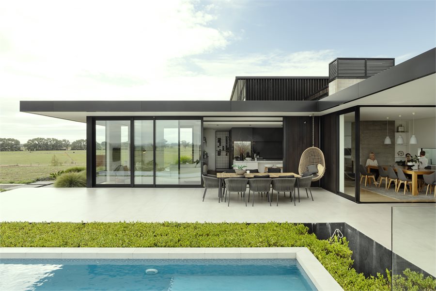 APL Architectural Series line the living spaces for a full view of the pool