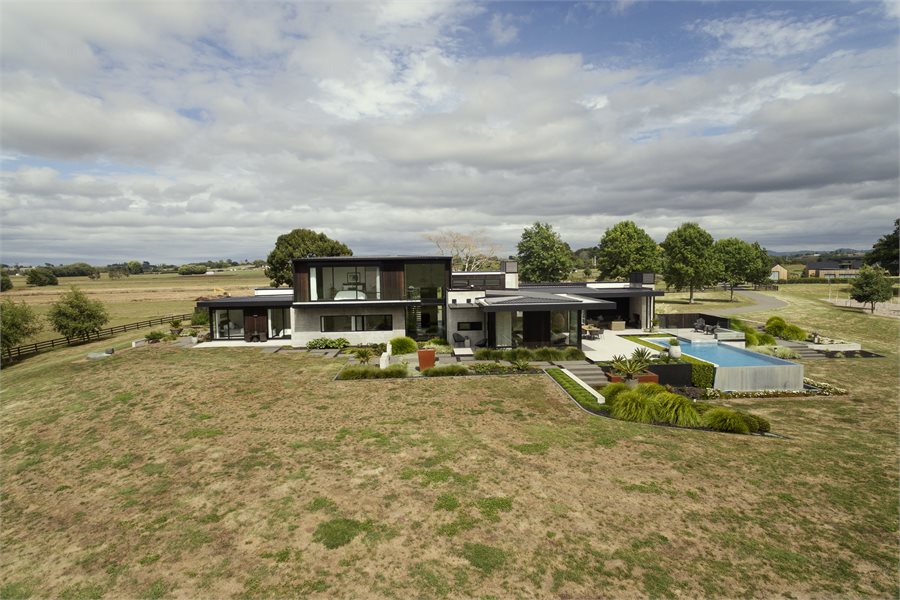 Matt Black joinery becomes the feature of the modern rural home