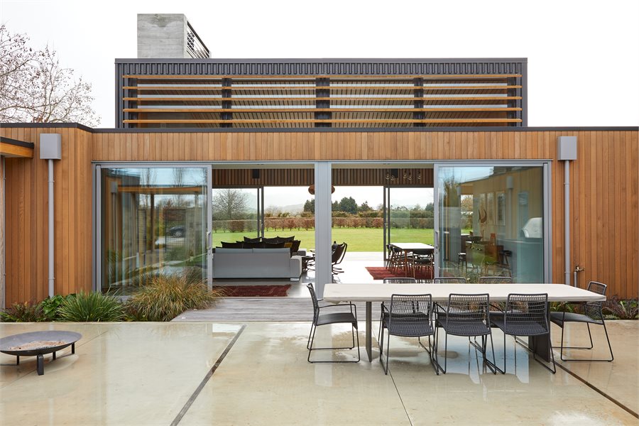 Sliding doors open wide to the internal courtyard